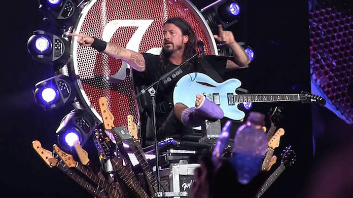 Watch: Broken Legged Dave Grohl Play Foo Fighters Set in a Light Up Throne