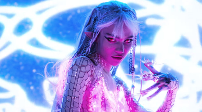 Grimes Falls for 'Player of Games' in New Song