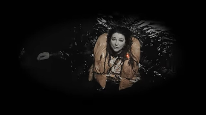 Watch: Kate Bush Swimming in a Water Tank in Her “And Dream of Sheep (Live)” Video