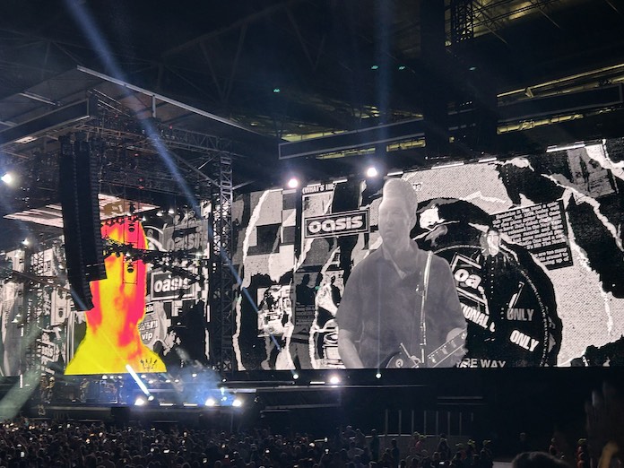 Noel Gallagher on the video screens at Wembley (photo by Mark Redfern).