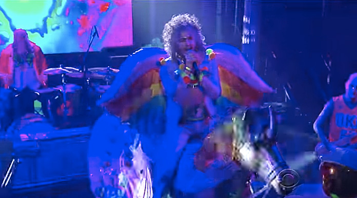 Watch The Flaming Lips Perform “There Should Be Unicorns” While Riding on a Unicorn on “Colbert”