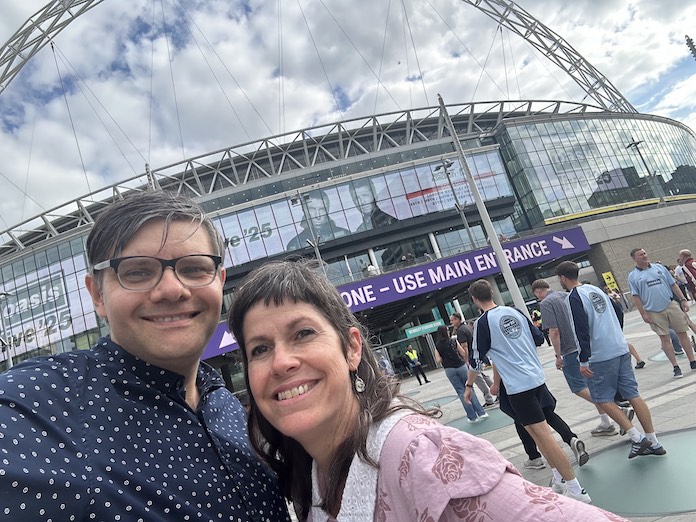 Wendy and I outside Wembley Stadium, just before we went in (self-portrait by us).