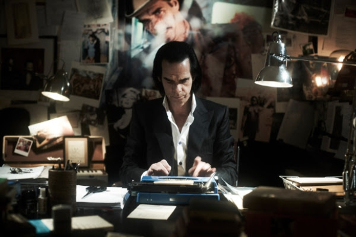 Watch: Nick Cave & the Bad Seeds “Give Us A Kiss” Lyric Video